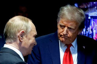 US president Donald Trump and Russian president Vladimir Putin shake hands after delivering a joint press conference following a US-Russia summit on Ukraine